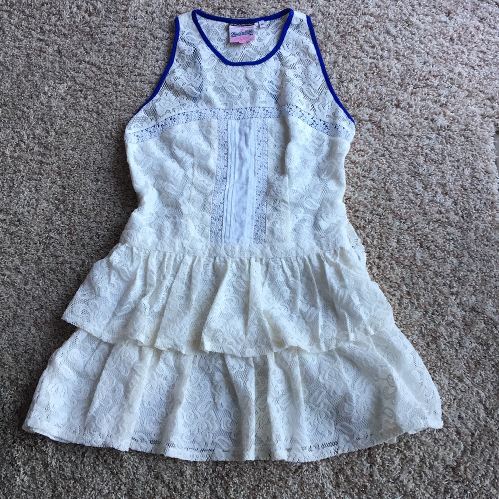A blue laced white, floral mini dress